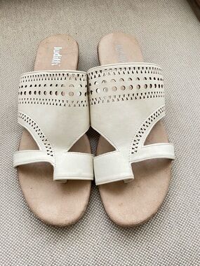 White Laser-Cut Leather Slide Sandals by Judith.